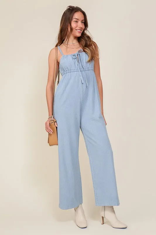 DENIM BLUE SLEEVELESS JUMPSUIT WITH SELF FRONT TIE