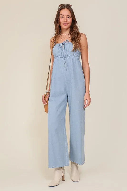 DENIM BLUE SLEEVELESS JUMPSUIT WITH SELF FRONT TIE